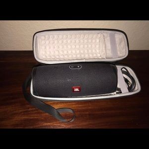 JBL speaker that comes with a case and a Strap